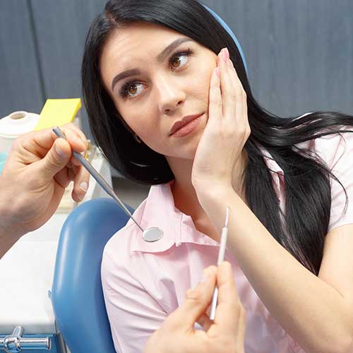 Tooth Extraction | Ultima Dental Wellness | SW Calgary Emergency Dentist in Kingsland